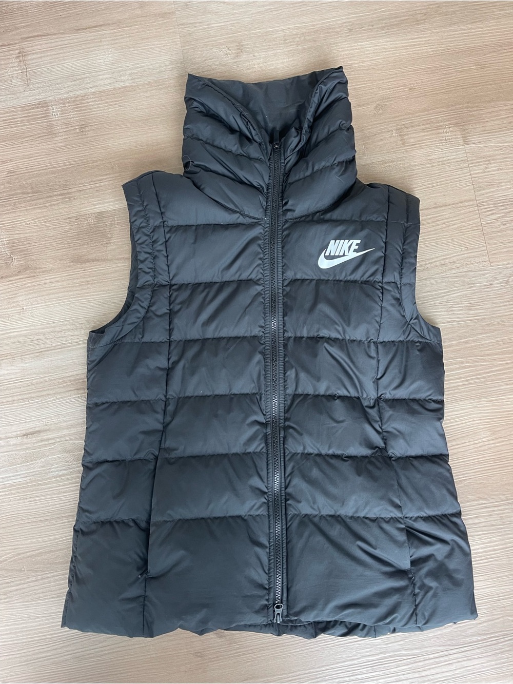 Nike Black Quilted Puffer Vest with White Swoosh